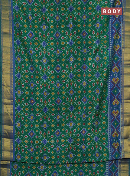 Semi tussar saree green with allover ikat prints and zari woven border