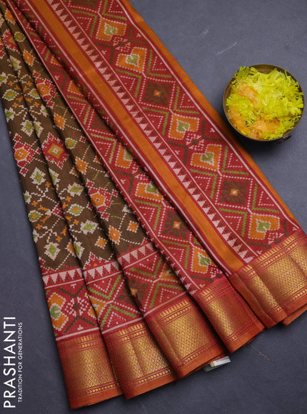 Semi tussar saree dark mustard and orange with allover ikat prints and zari woven border