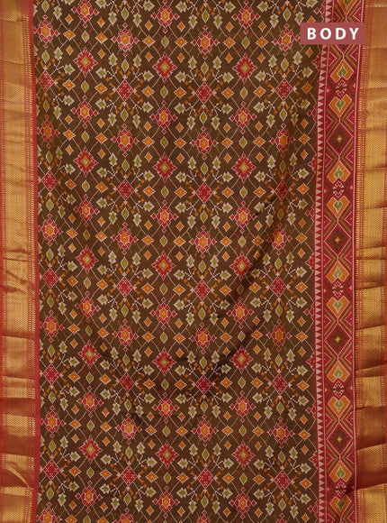 Semi tussar saree dark mustard and orange with allover ikat prints and zari woven border