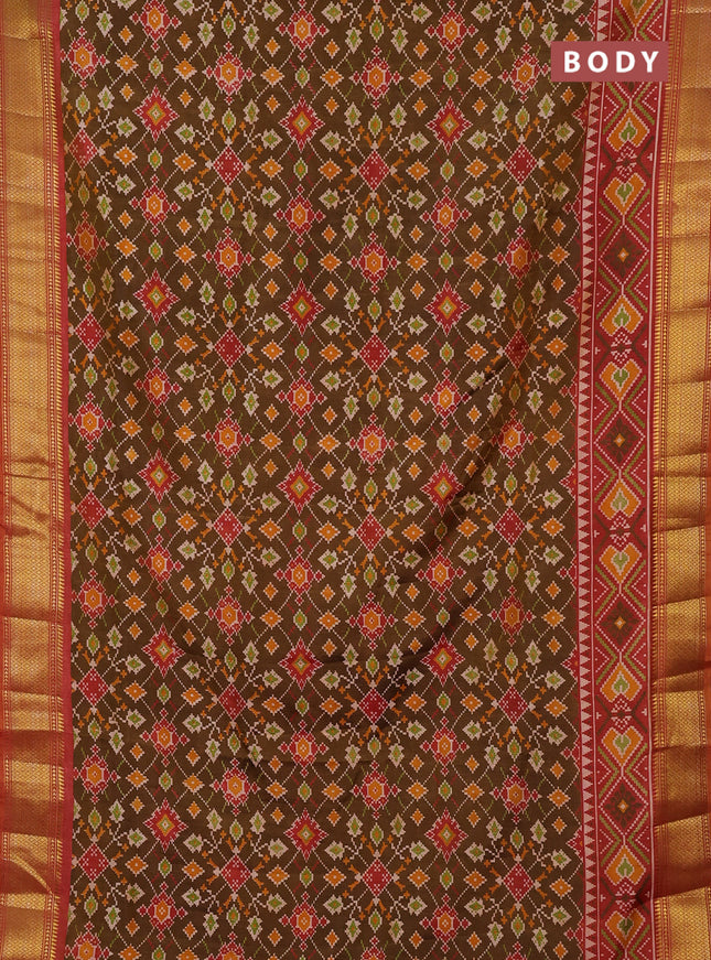 Semi tussar saree dark mustard and orange with allover ikat prints and zari woven border
