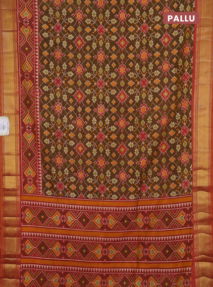 Semi tussar saree dark mustard and orange with allover ikat prints and zari woven border