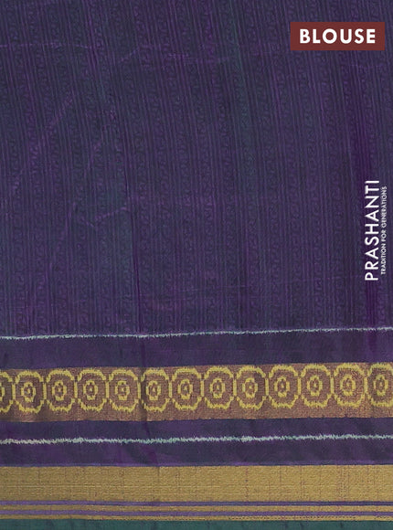 Semi tussar saree dual shade of bluish green and purple with allover ikat prints and ikat woven zari border