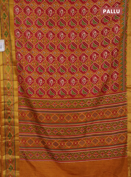 Semi tussar saree mustard yellow and maroon with allover patola prints and ikat woven zari border