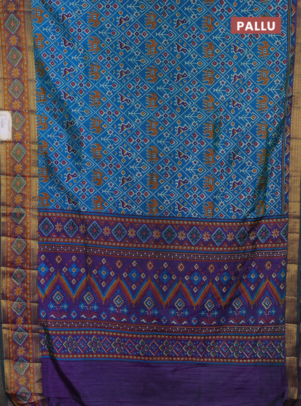 Semi tussar saree cs blue and green with allover patola prints and ikat zari woven border