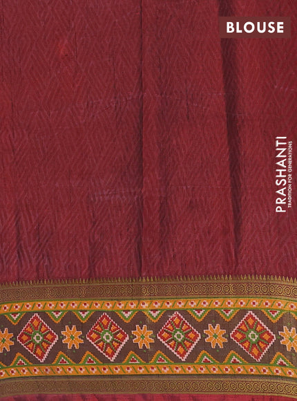 Semi tussar saree red and maroon with allover patola prints and ikat zari woven border