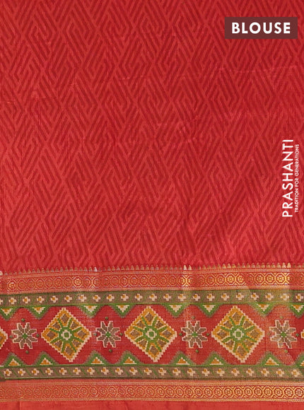 Semi tussar saree mustard yellow and rustic orange with allover patola prints and ikat zari woven border