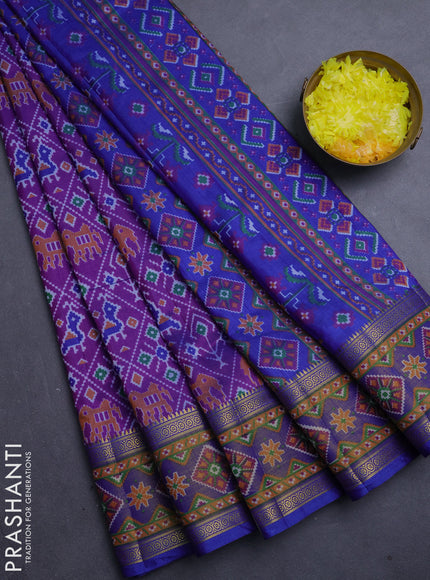 Semi tussar saree purple and blue with allover patola prints and ikat zari woven border