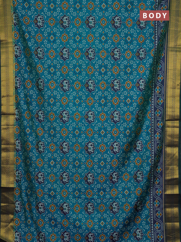 Semi tussar saree blue and green with allover patola prints and zari woven border