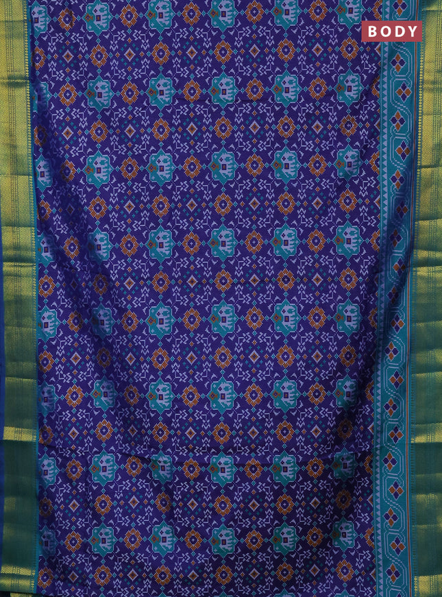 Semi tussar saree blue and teal green with allover patola prints and zari woven border