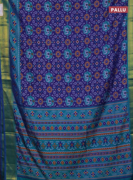 Semi tussar saree blue and teal green with allover patola prints and zari woven border
