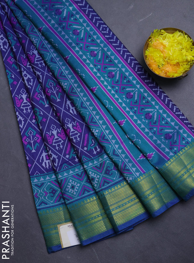 Semi tussar saree navy blue and teal green with allover patola prints and zari woven border