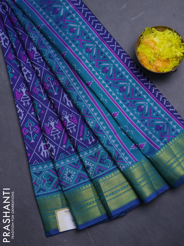 Semi tussar saree navy blue and teal green with allover patola prints and zari woven border