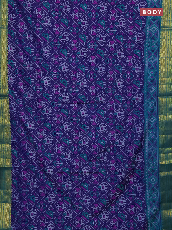 Semi tussar saree navy blue and teal green with allover patola prints and zari woven border