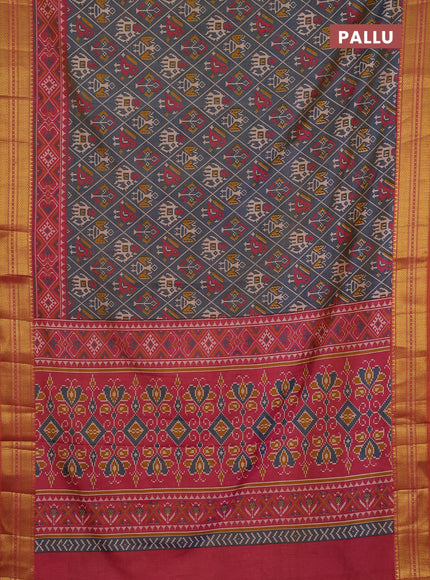 Semi tussar saree grey and orange with allover patola prints and zari woven border