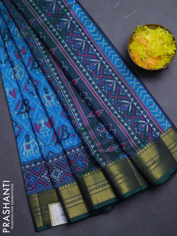 Semi tussar saree dual shade of bluish green and green with allover patola prints and zari woven border