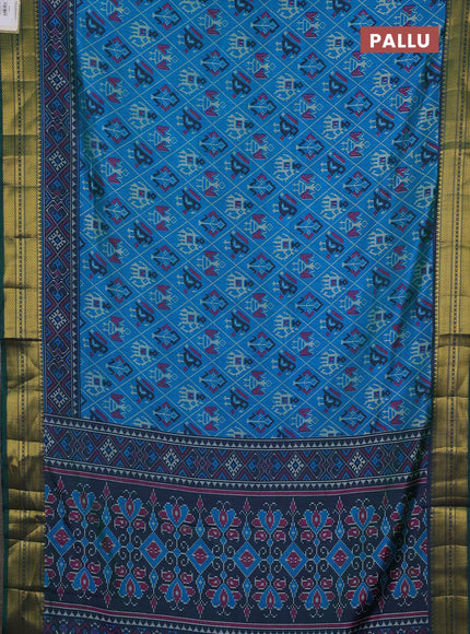 Semi tussar saree dual shade of bluish green and green with allover patola prints and zari woven border