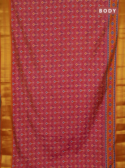 Semi tussar saree dual shade of pinkish orange with allover ikat prints and zari woven border