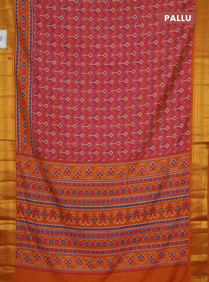 Semi tussar saree dual shade of pinkish orange with allover ikat prints and zari woven border