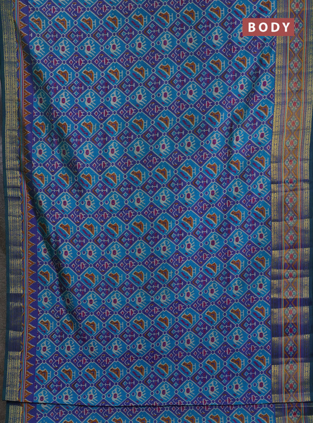 Semi tussar saree blue and purple with allover patola prints and ikat zari woven border