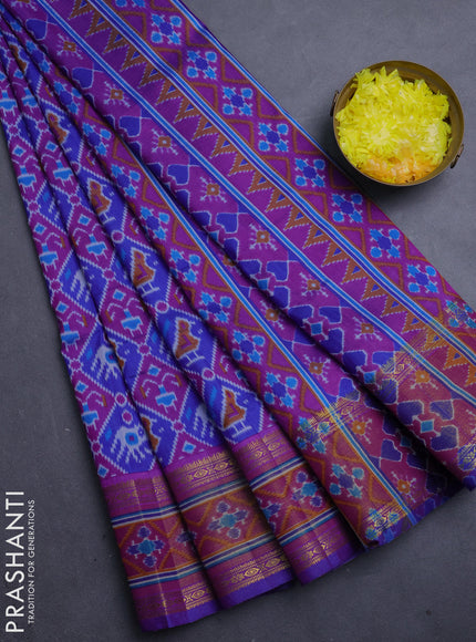 Semi tussar saree blue and dark pink with allover patola prints and ikat zari woven border