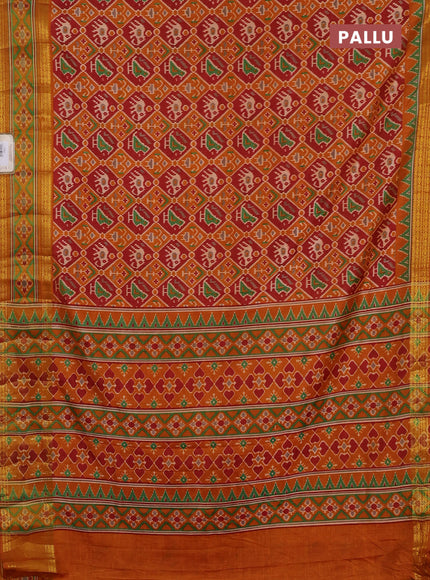 Semi tussar saree maroon and mustard yellow with allover patola prints and ikat zari woven border