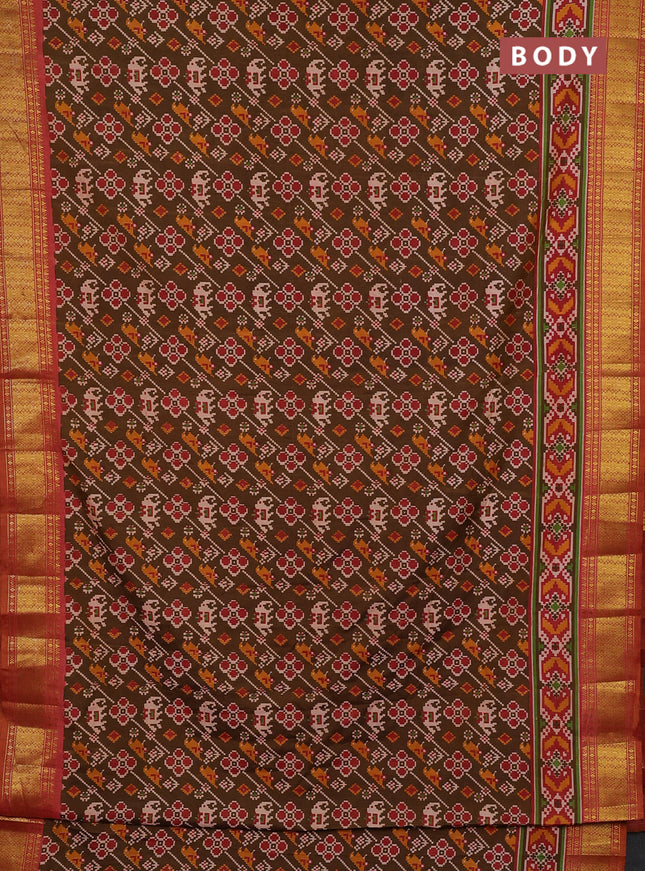 Semi tussar saree mehendi green and rust shade with allover patola prints and zari woven border