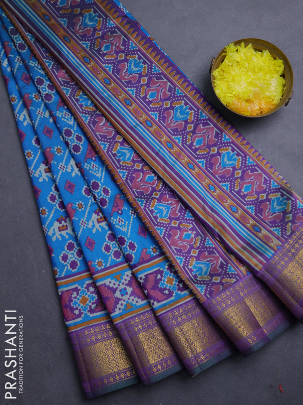 Semi tussar saree blue and purple with allover patola prints and zari woven border