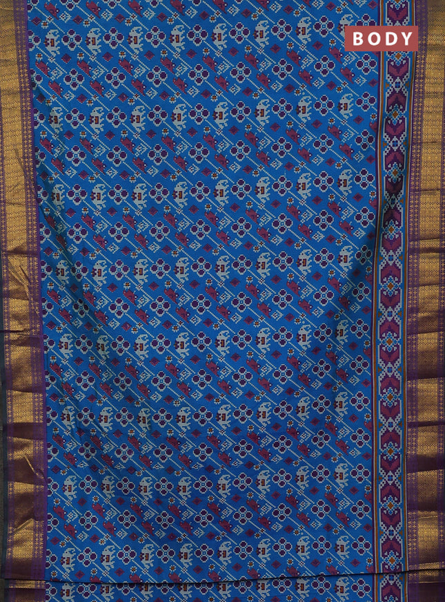 Semi tussar saree blue and purple with allover patola prints and zari woven border