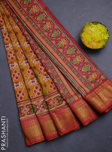 Semi tussar saree mustard yellow and maroon with allover patola prints and zari woven border