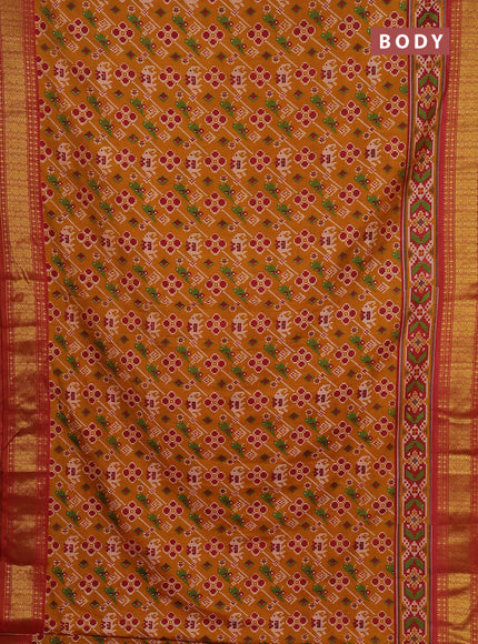Semi tussar saree mustard yellow and maroon with allover patola prints and zari woven border