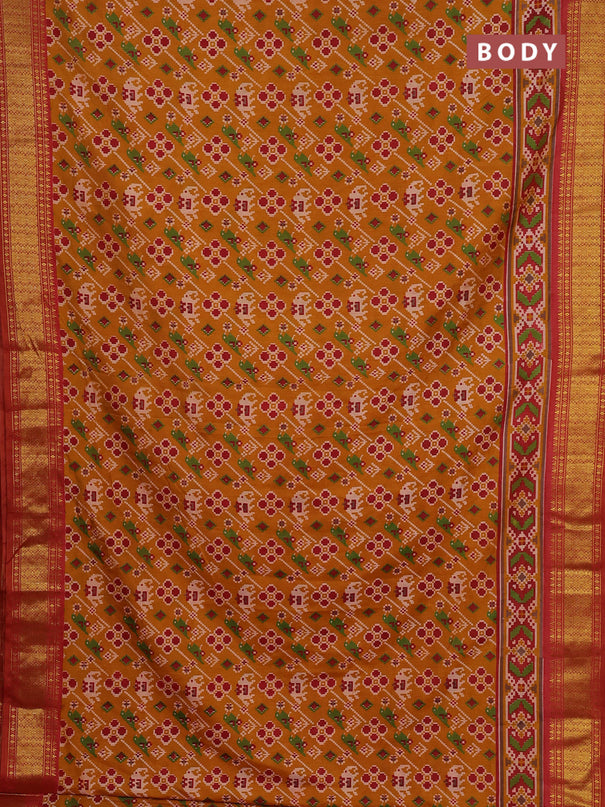 Semi tussar saree mustard yellow and maroon with allover patola prints and zari woven border