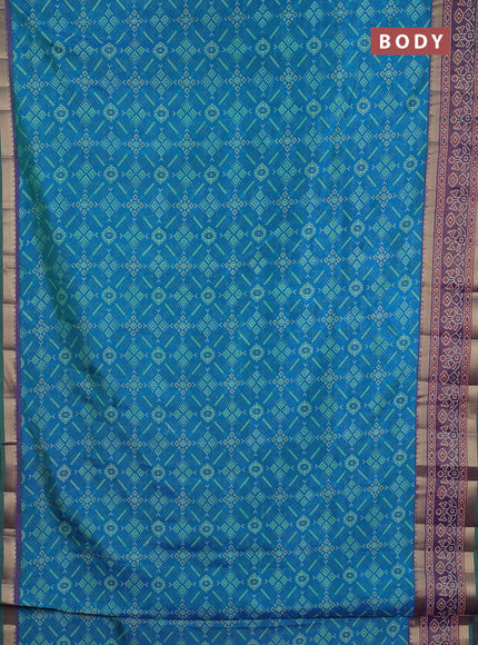 Semi tussar saree dual shade of greeinsh blue and purple with allover ikat prints and ikat zari woven border