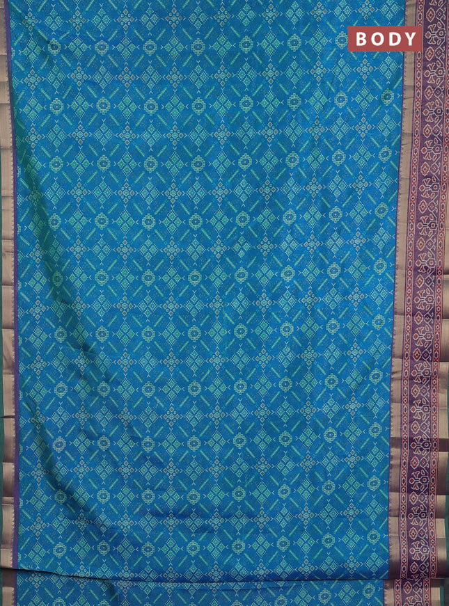 Semi tussar saree dual shade of greeinsh blue and purple with allover ikat prints and ikat zari woven border