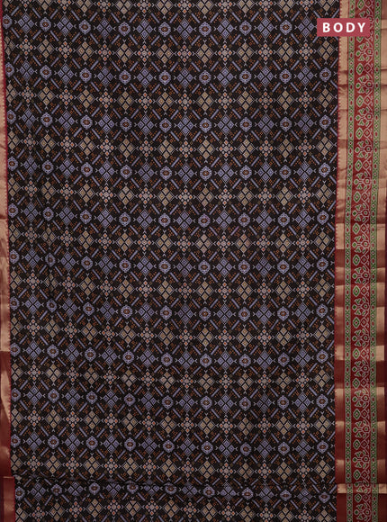 Semi tussar saree black and maroon with allover ikat prints and ikat zari woven border