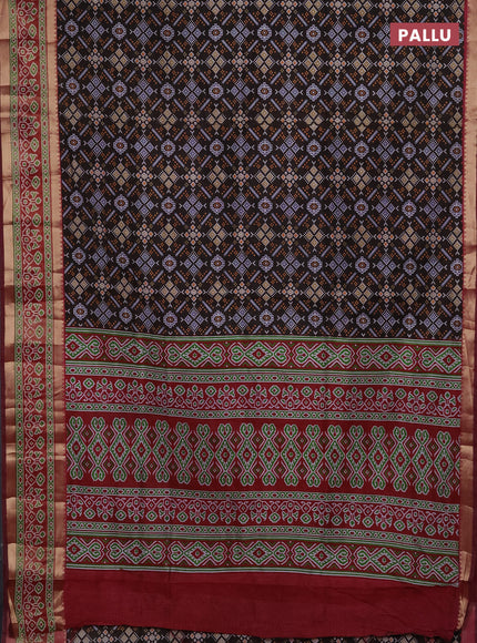 Semi tussar saree black and maroon with allover ikat prints and ikat zari woven border