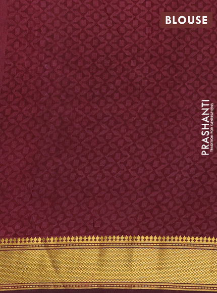 Semi tussar saree bottle green and deep maroon with allover ikat prints and zari woven border