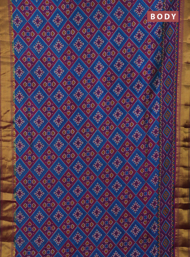 Semi tussar saree dual shade of bluish green and purple with allover ikat prints and zari woven border