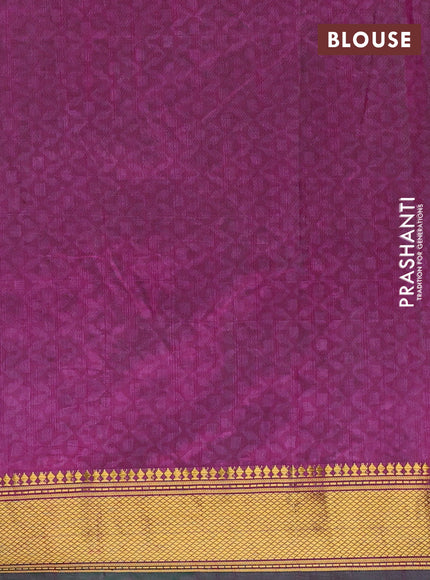 Semi tussar saree dual shade of bluish green and purple with allover ikat prints and zari woven border