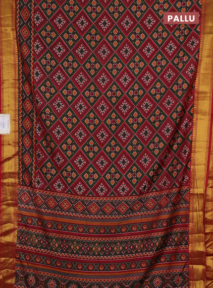 Semi tussar saree dark green and maroon with allover ikat prints and zari woven border