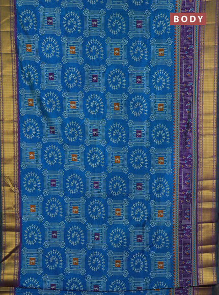 Semi tussar saree cs blue and purple with allover warli prints and ikat zari woven border