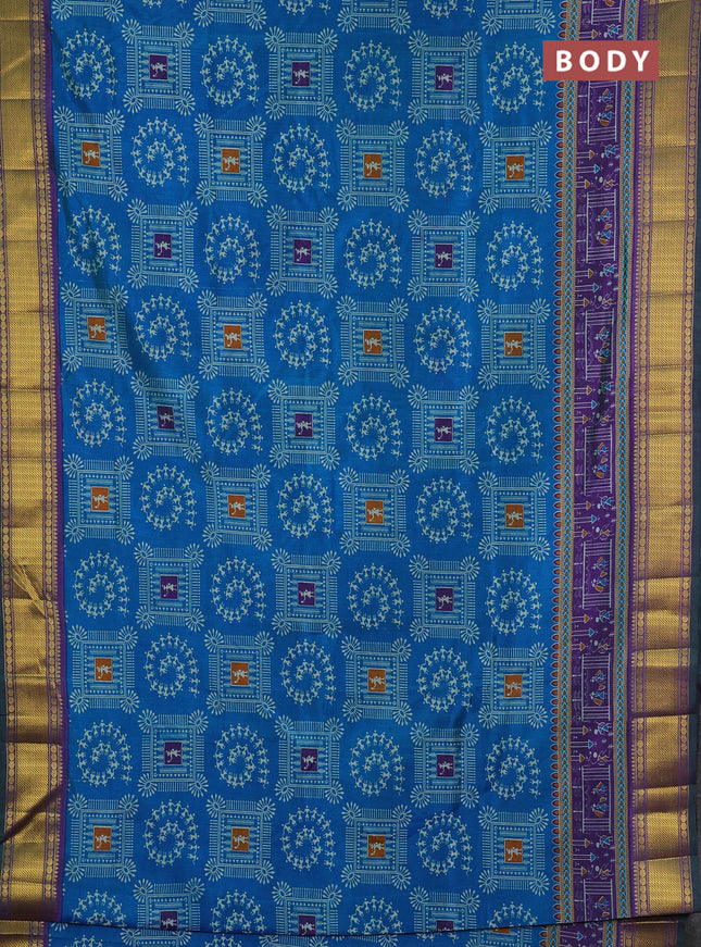 Semi tussar saree cs blue and purple with allover warli prints and ikat zari woven border