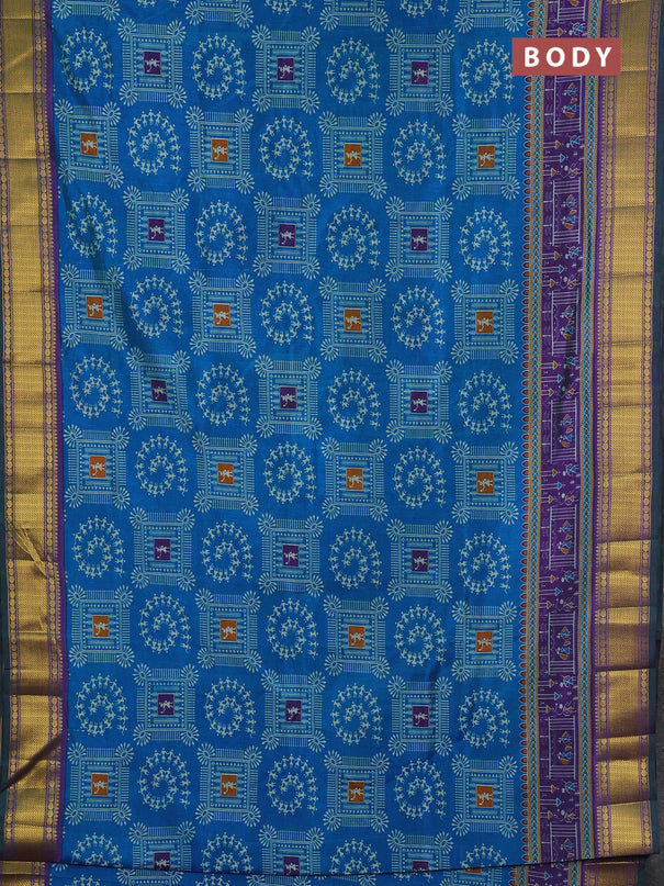 Semi tussar saree cs blue and purple with allover warli prints and ikat zari woven border