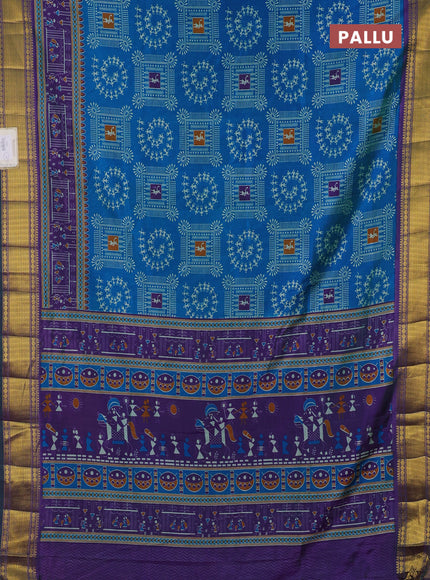 Semi tussar saree cs blue and purple with allover warli prints and ikat zari woven border