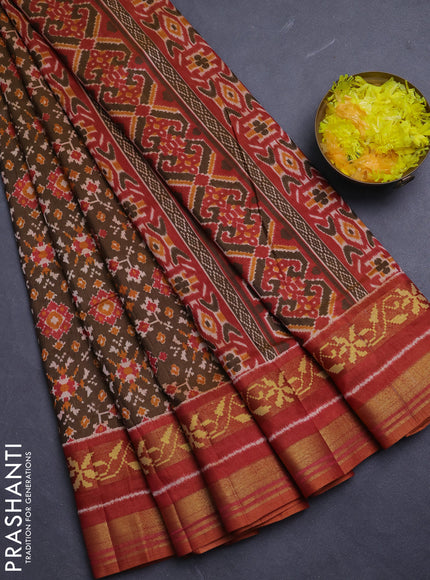 Semi tussar saree mehendi green and rustic orange with allover ikat prints and ikat woven zari border