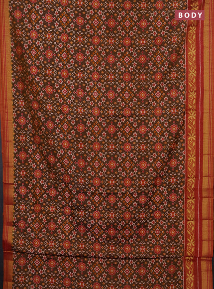 Semi tussar saree mehendi green and rustic orange with allover ikat prints and ikat woven zari border