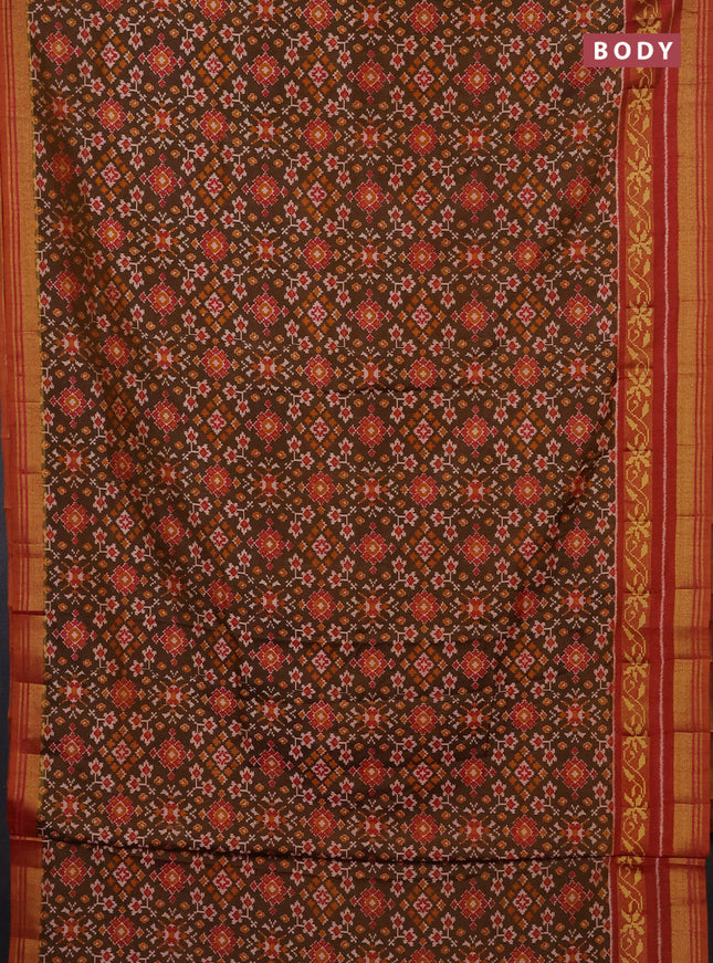 Semi tussar saree mehendi green and rustic orange with allover ikat prints and ikat woven zari border