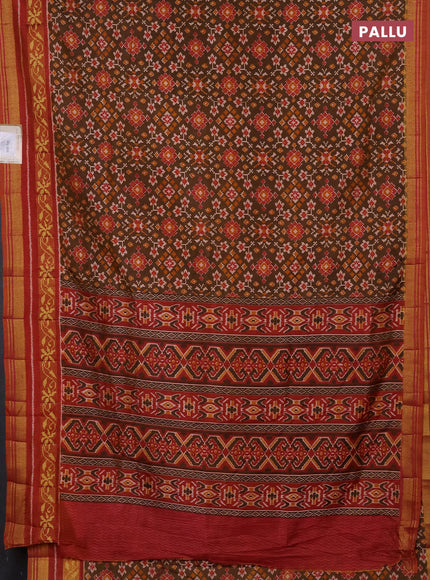 Semi tussar saree mehendi green and rustic orange with allover ikat prints and ikat woven zari border