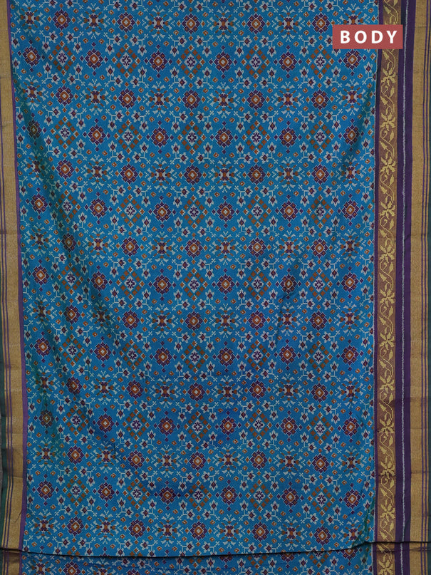 Semi tussar saree dual shade of bluish green and purple with allover ikat prints and ikat woven zari border