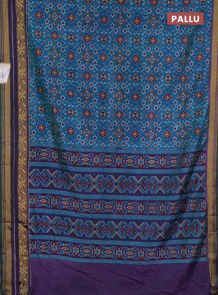 Semi tussar saree dual shade of bluish green and purple with allover ikat prints and ikat woven zari border