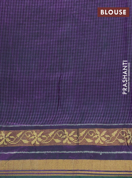 Semi tussar saree dual shade of bluish green and purple with allover ikat prints and ikat woven zari border